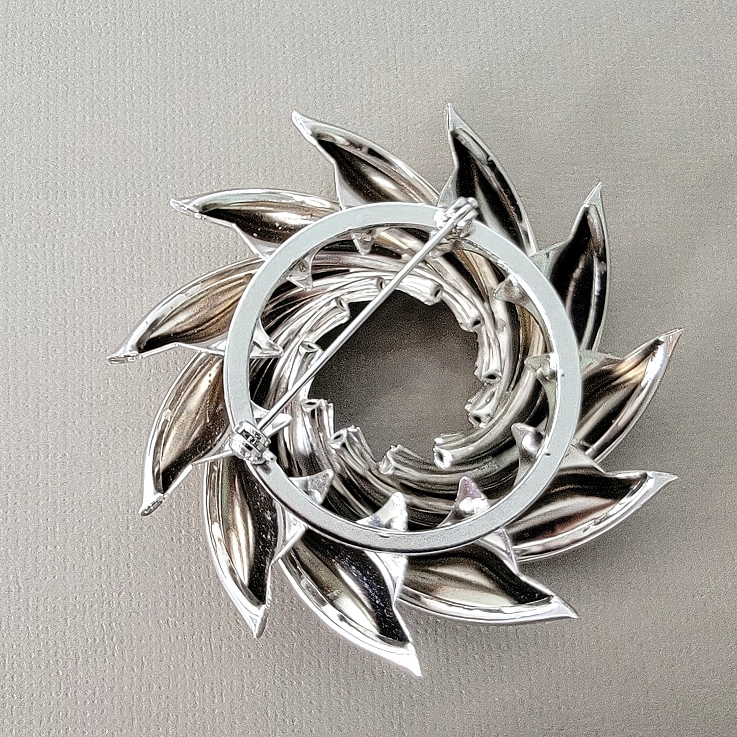 Back of silver tone wreath pin.