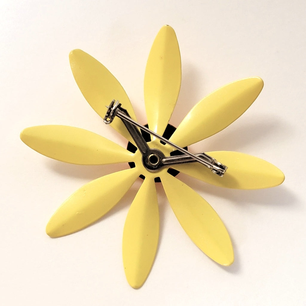 Back of enamel flower pin.