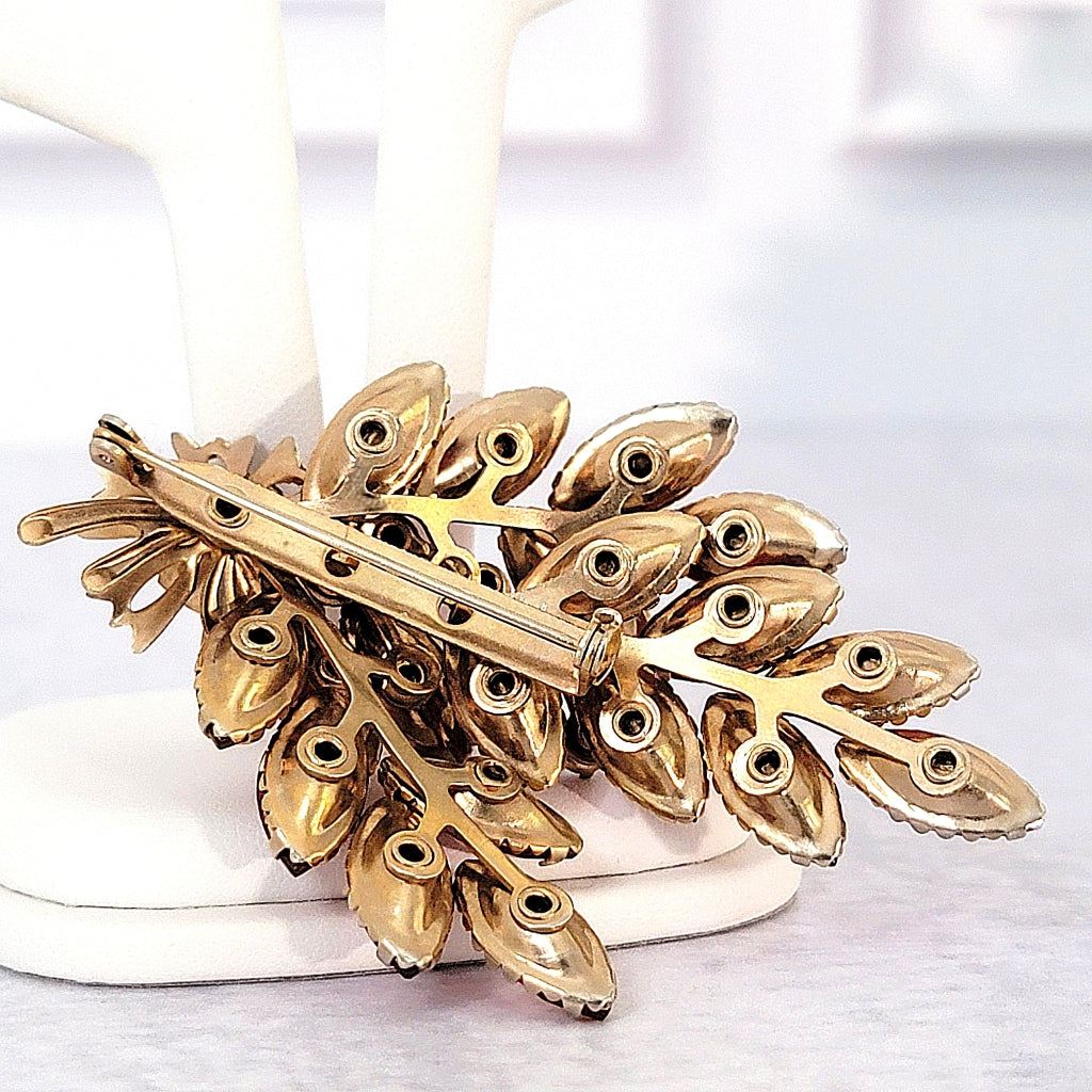 Riveted setting on a vintage brooch.