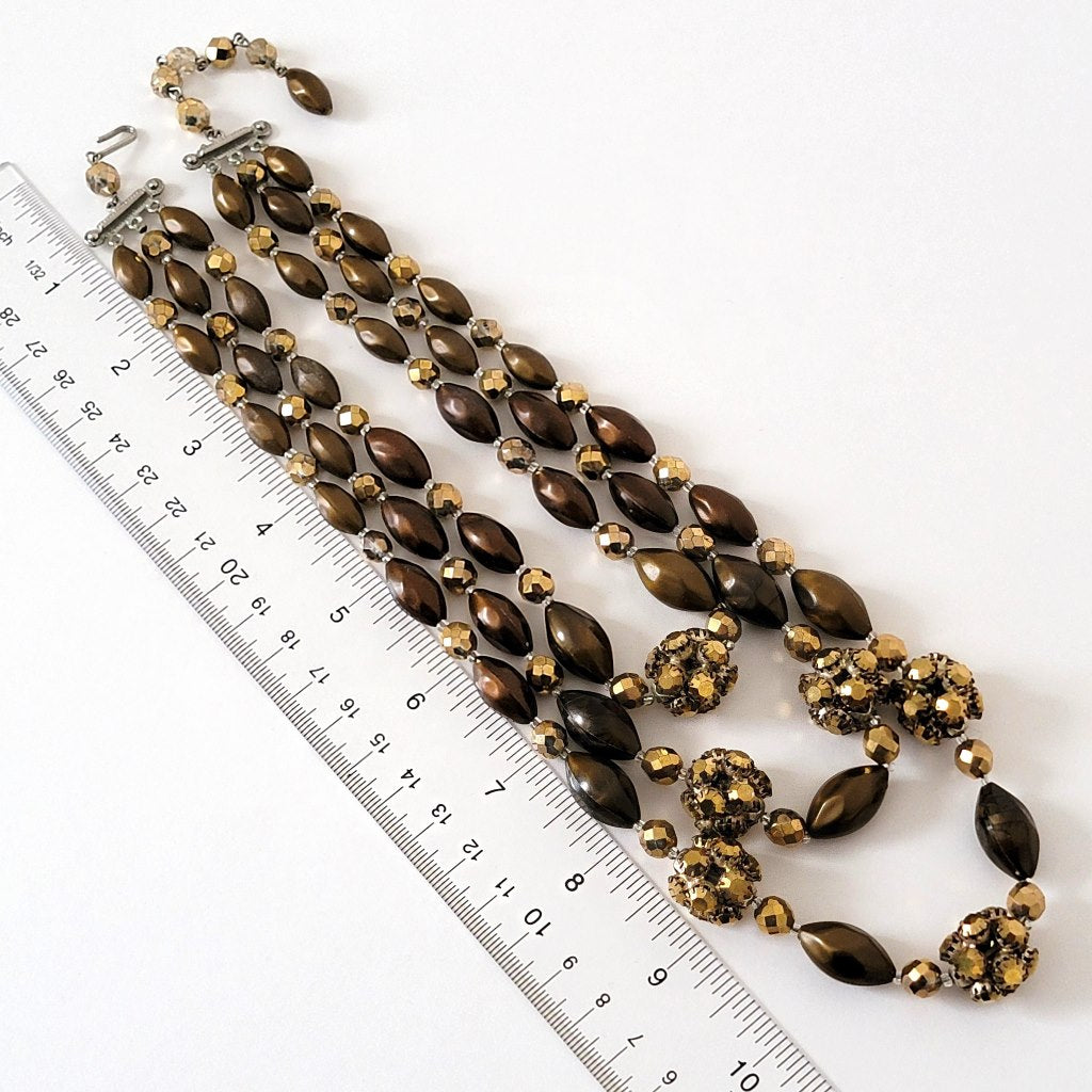 Necklace with ruler.