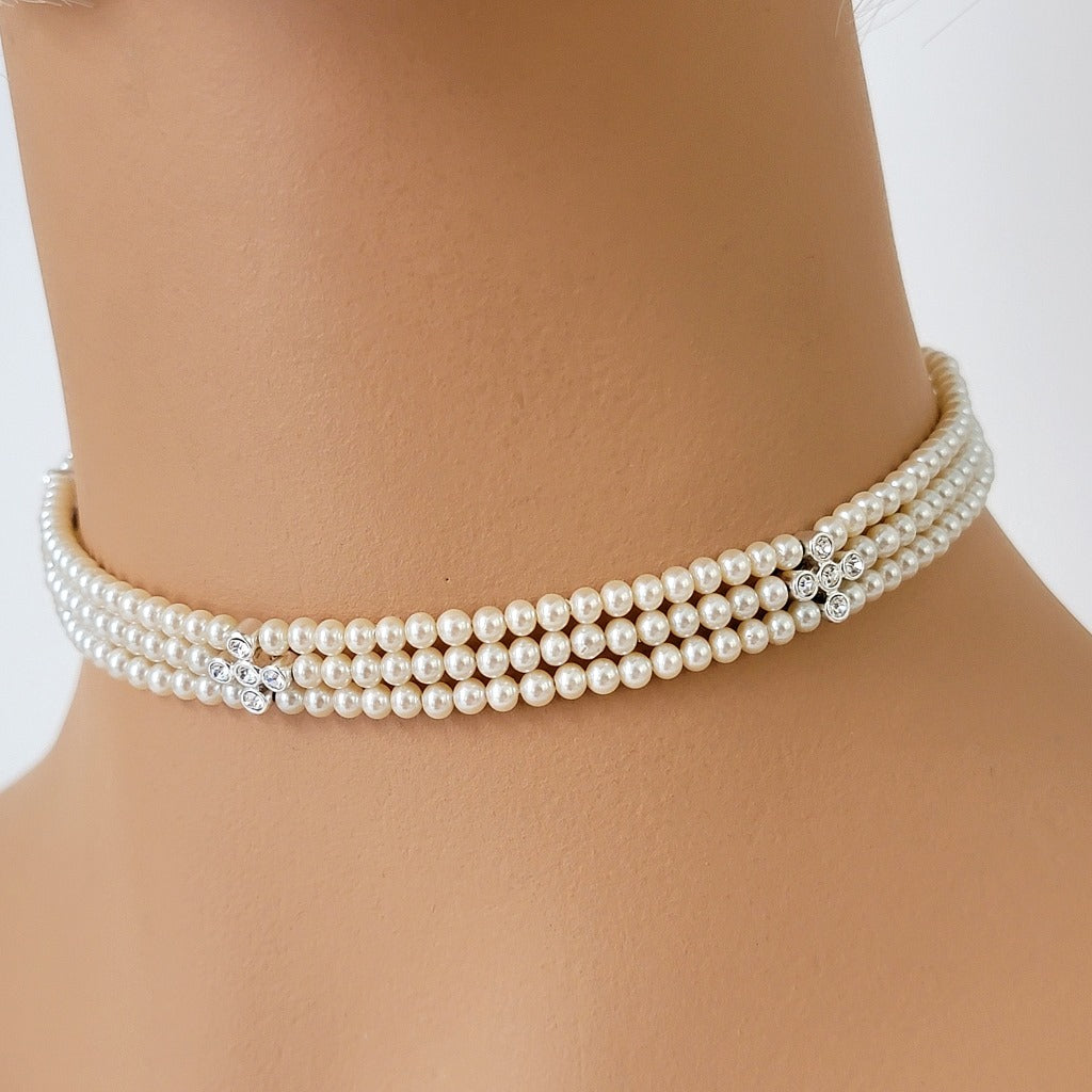 Three strand faux pearl choker on mannequin.