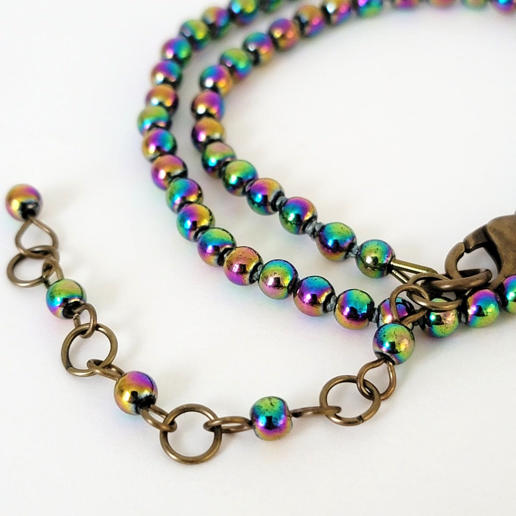 Extender chain on beaded necklace.