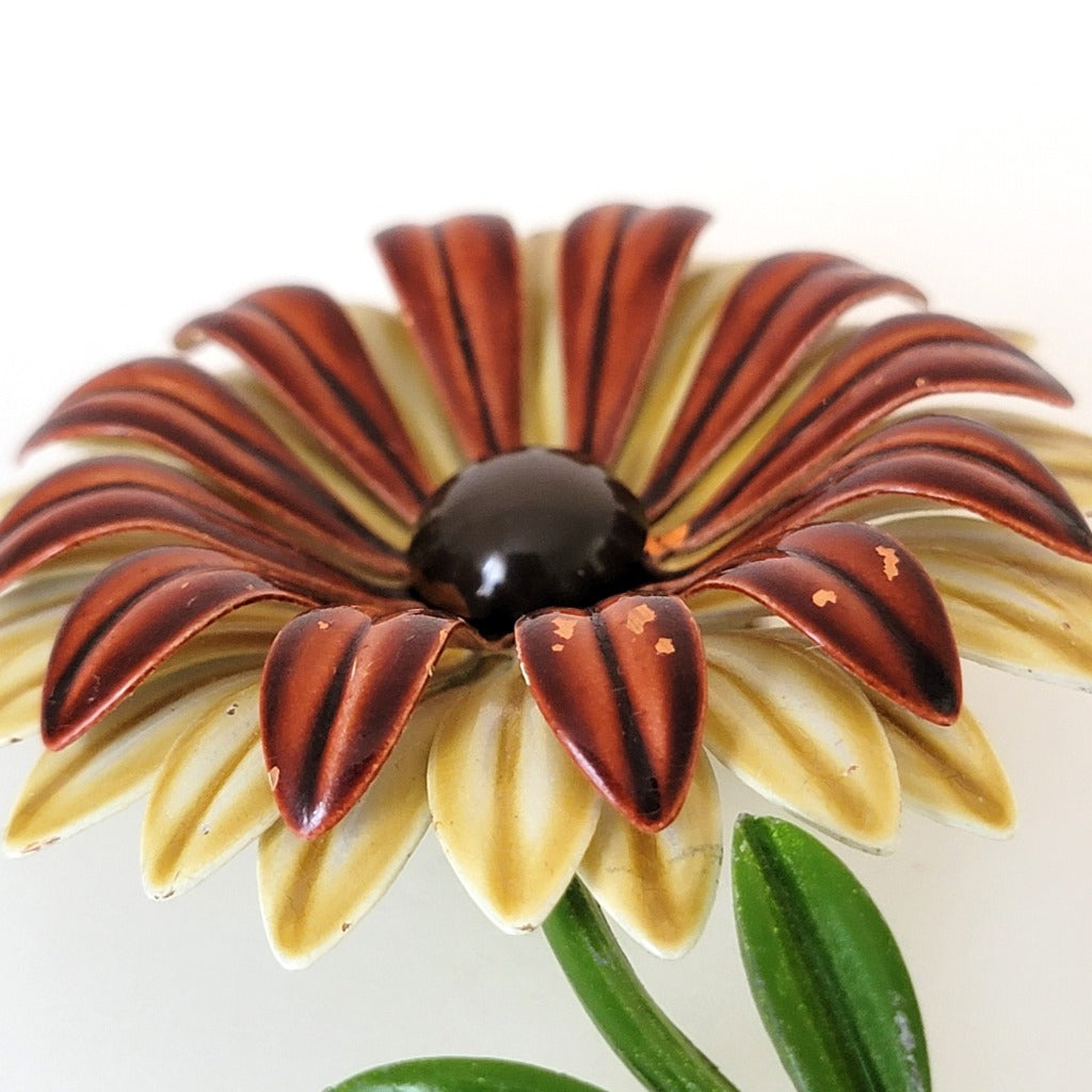 Layered enamel flower petals.