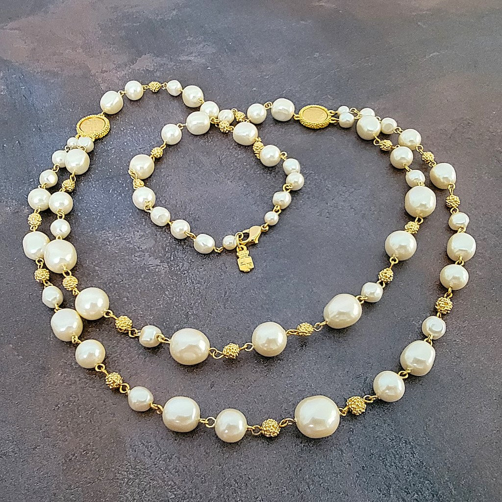 Liz Claiborne faux pearl and gold tone beaded necklace.