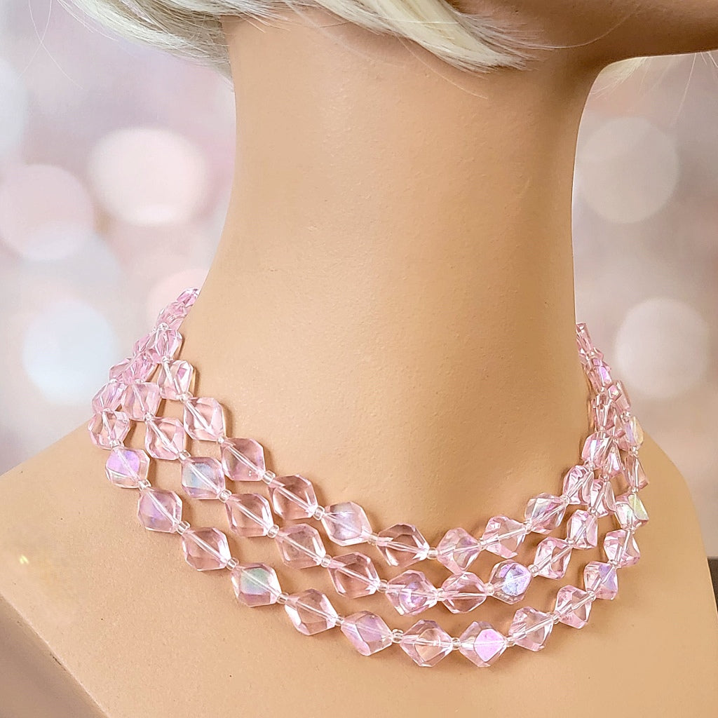 Pink three strand vintage choker on a mannequin.