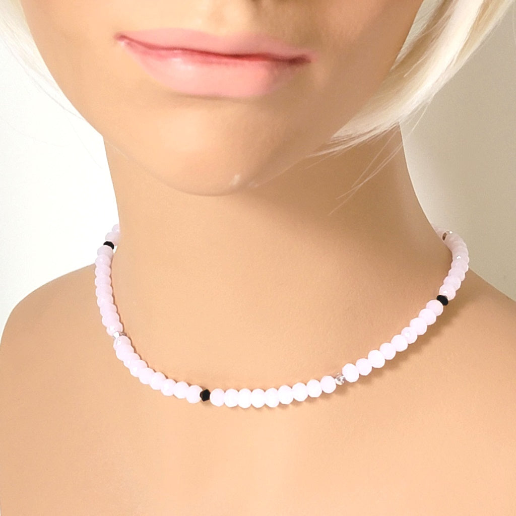 Minimalist pink glass beaded choker, shown on a mannequin.