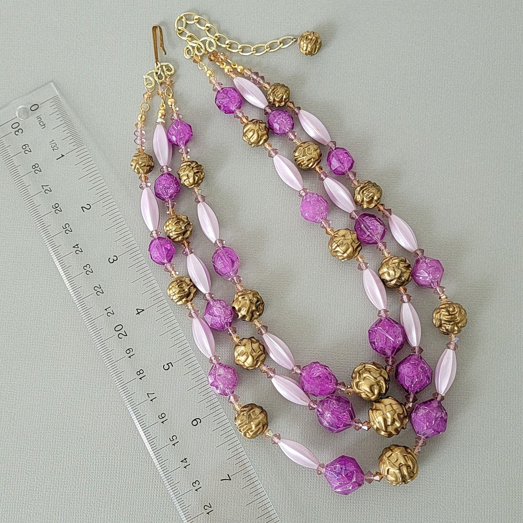 Vintage purple multistrand choker with ruler.