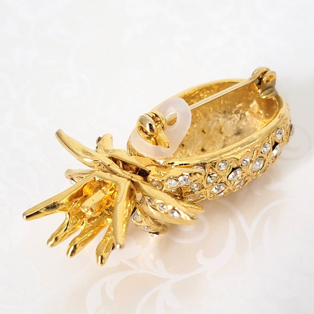 Back view of rhinestone pineapple brooch, showing brooch lock.