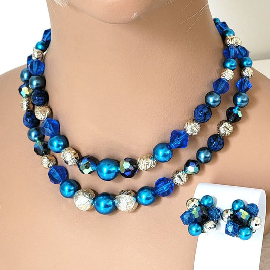 Vintage blue faux pearl choker and clip on earrings set, 50s style, with silver tone accents. Shown on a mannequin.