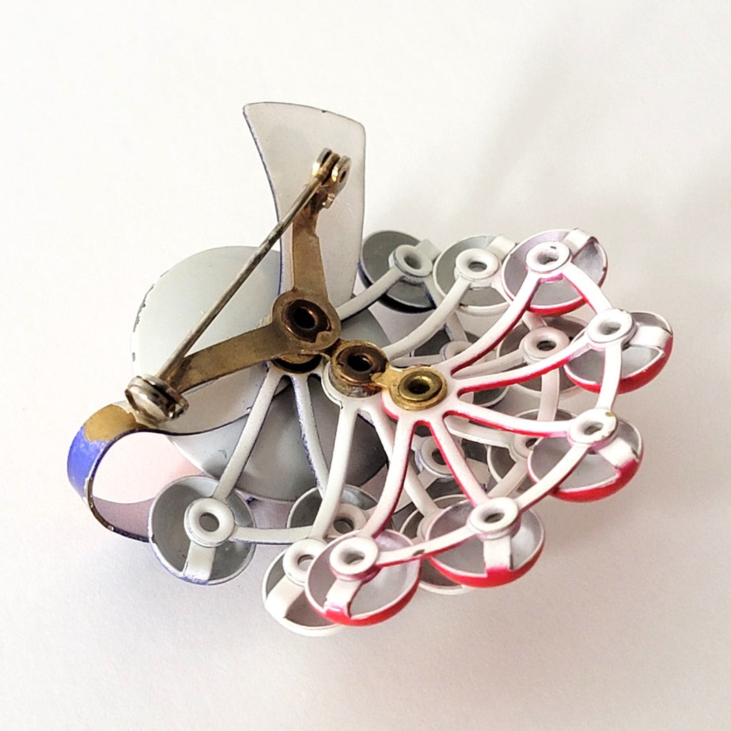 Back of riveted brooch.