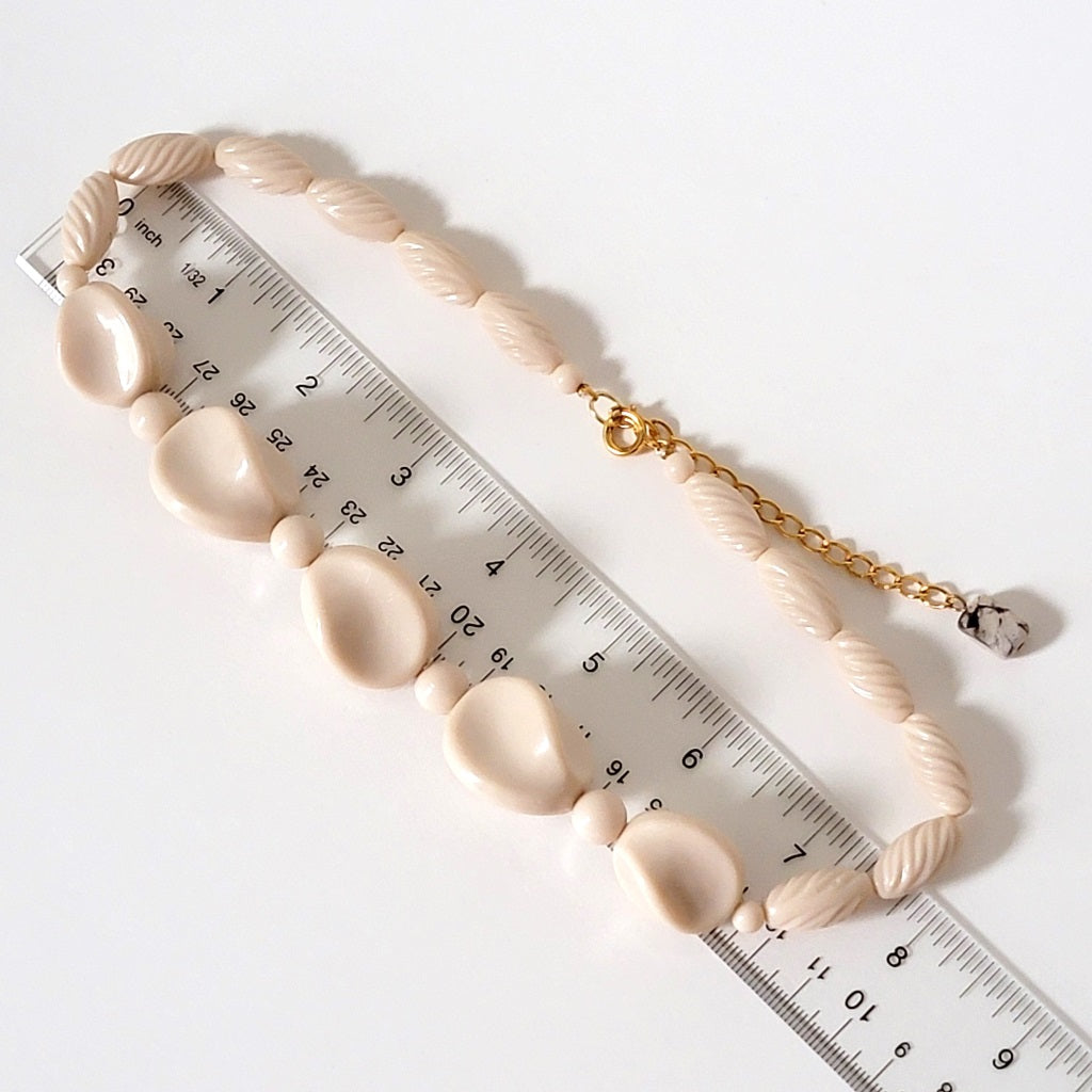 Lucite necklace with ruler.