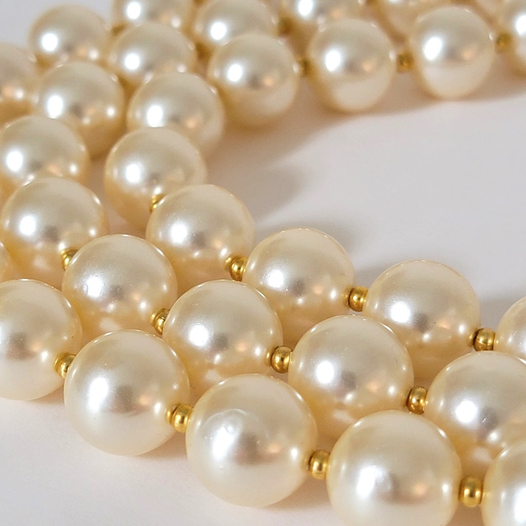 Faux pearl beads.