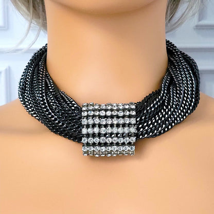 Black aluminum chain necklace on a mannequin.