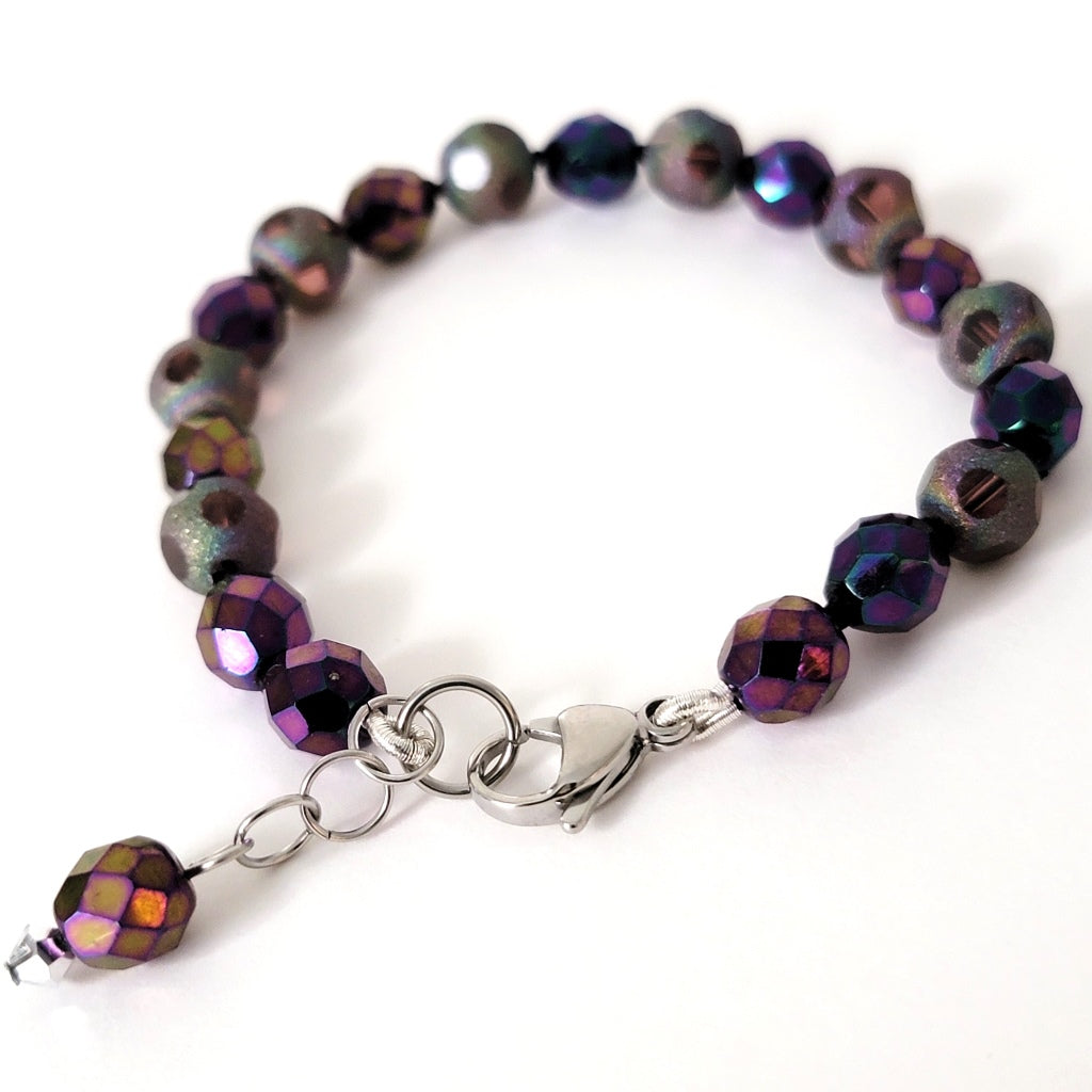 Purple glass beaded bracelet.