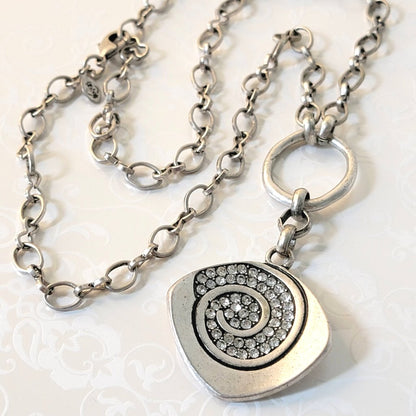Premier Designs antique silver tone rhinestone necklace. Closeup view of pendant.