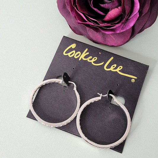 Crystal hoop earrings on original card by Cookie Lee.