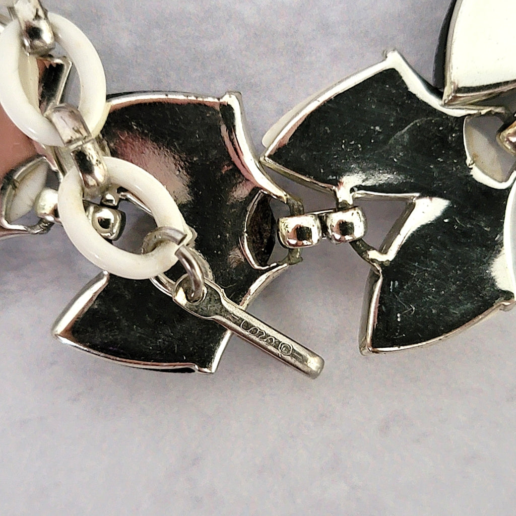 Coro signature mark on a necklace clasp.