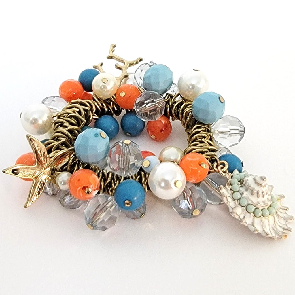 Shell and starfish charm bracelet.