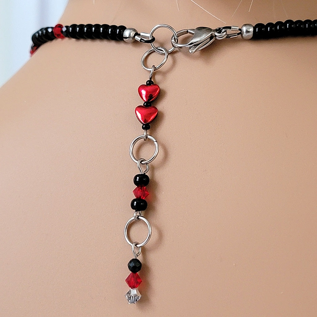 Beaded extender chain on a necklace.
