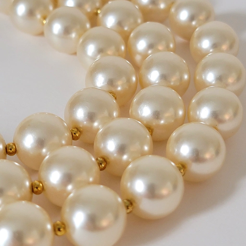Faux pearl beads.