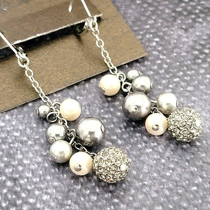 Long dangling cream and gray faux pearl earrings, with rhinestone ball beads.