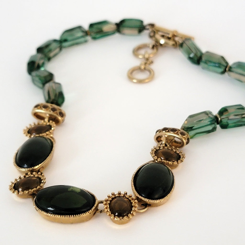 Green glass necklace.