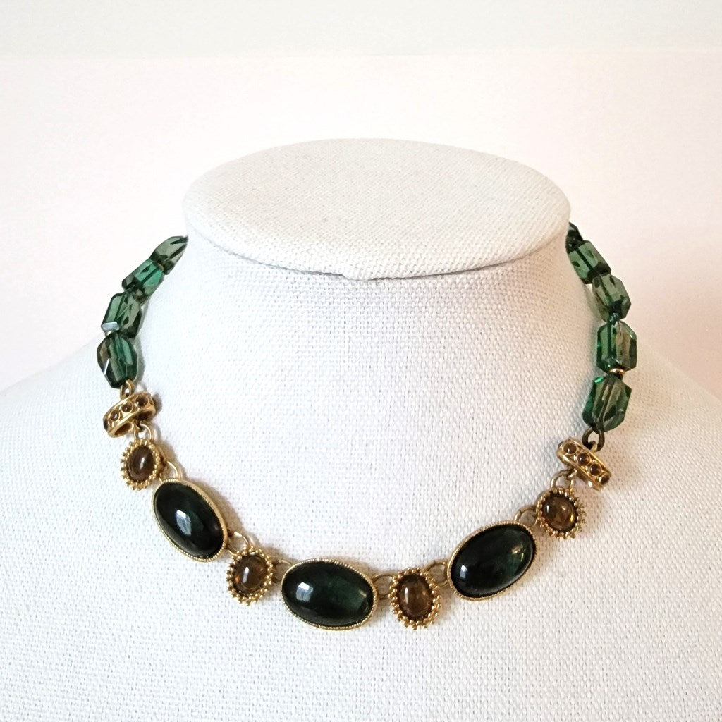 Green necklace.