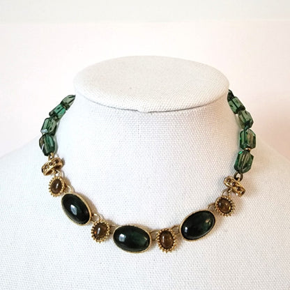 Green necklace.