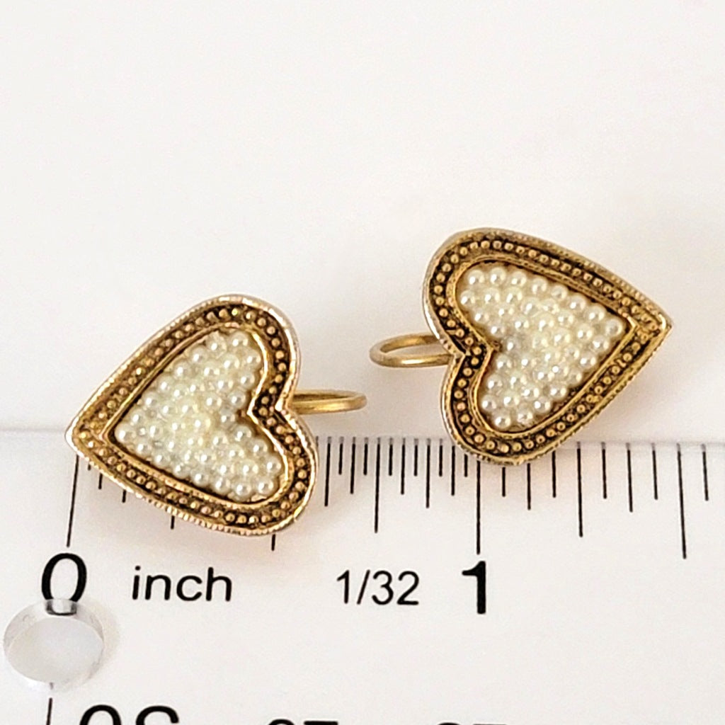 Heart earrings with ruler.