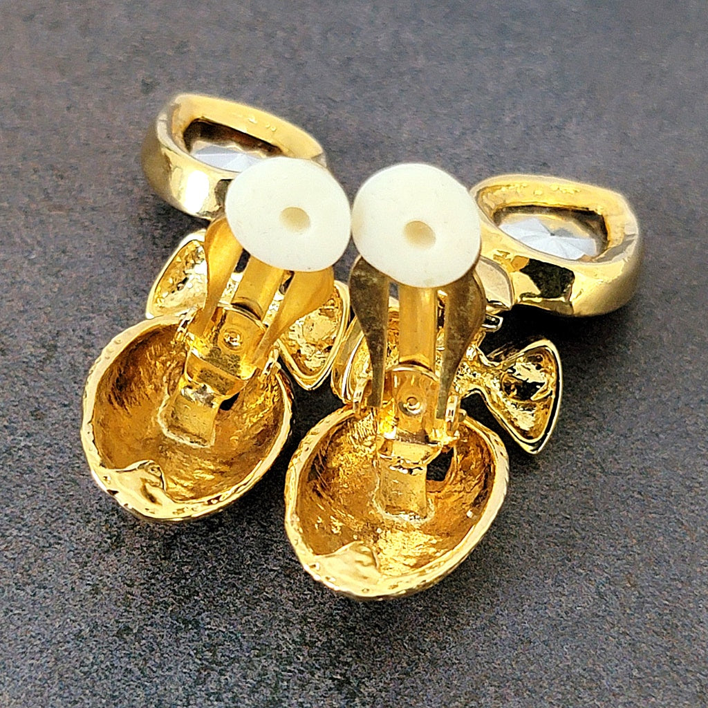 Inside a pair of clip earrings.