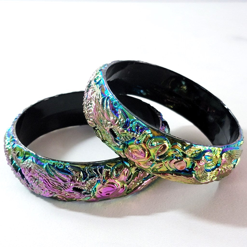 Black iridescent coated plastic bangle bracelets.