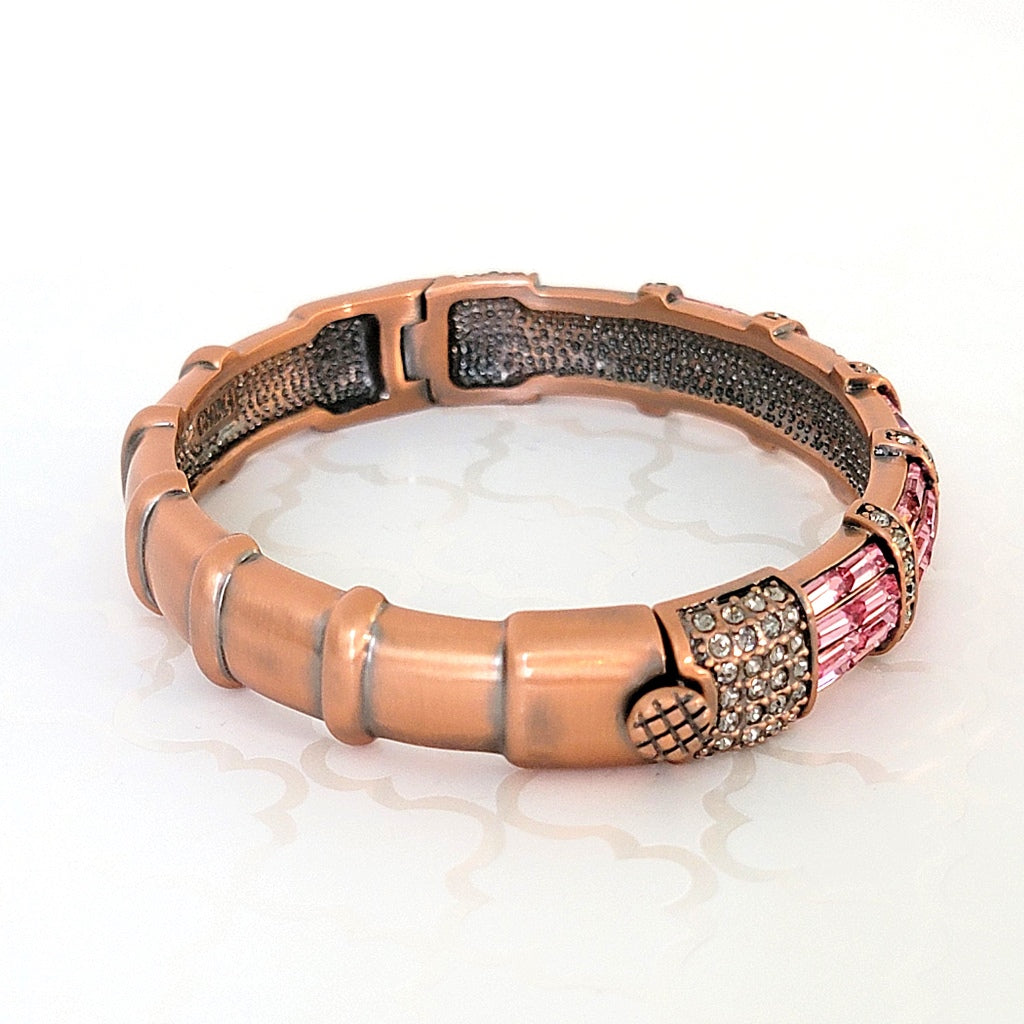 Hinged bracelet clasp.