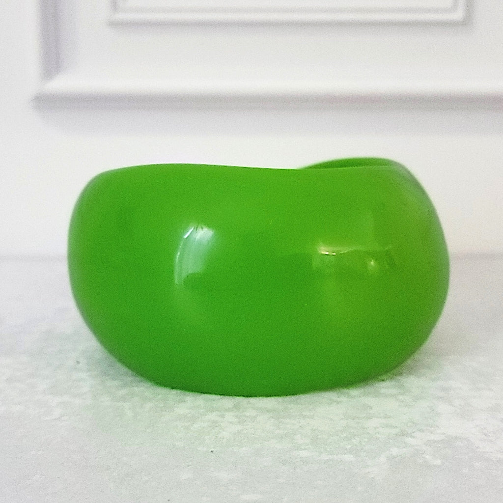 Big green chunky bracelet.
