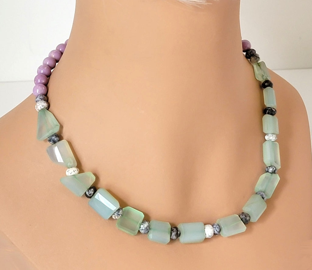 Pastel green and purple stone nugget beaded necklace, shown on a mannequin.