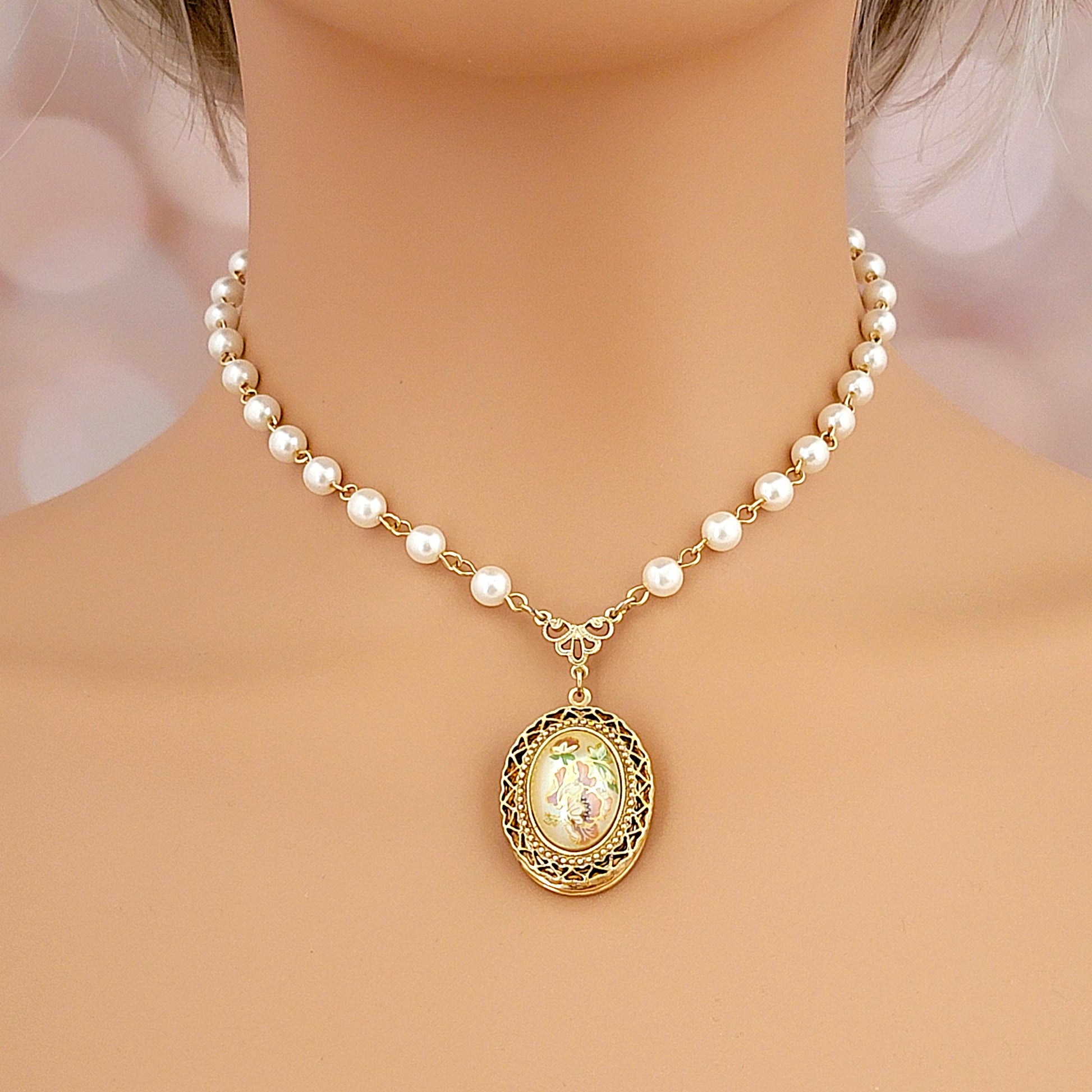 Vintage locket choker necklace on mannequin.