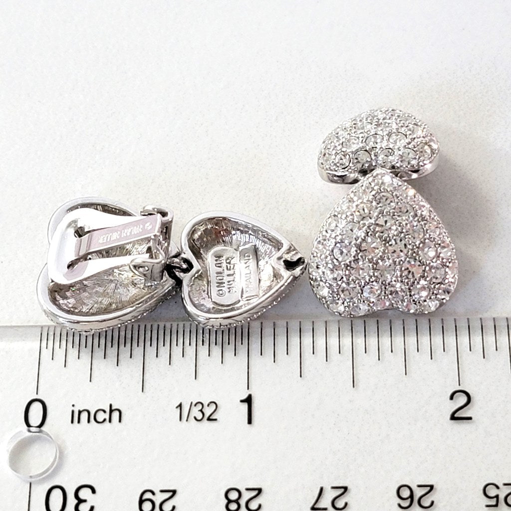 Heart earrings with ruler.