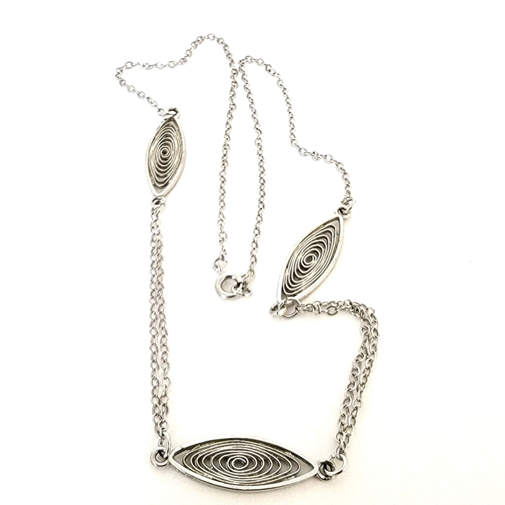 Minimalist silver tone choker.