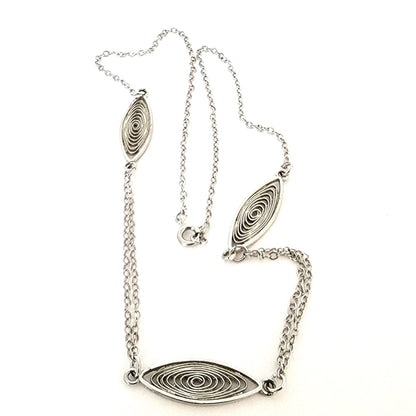 Minimalist silver tone choker.
