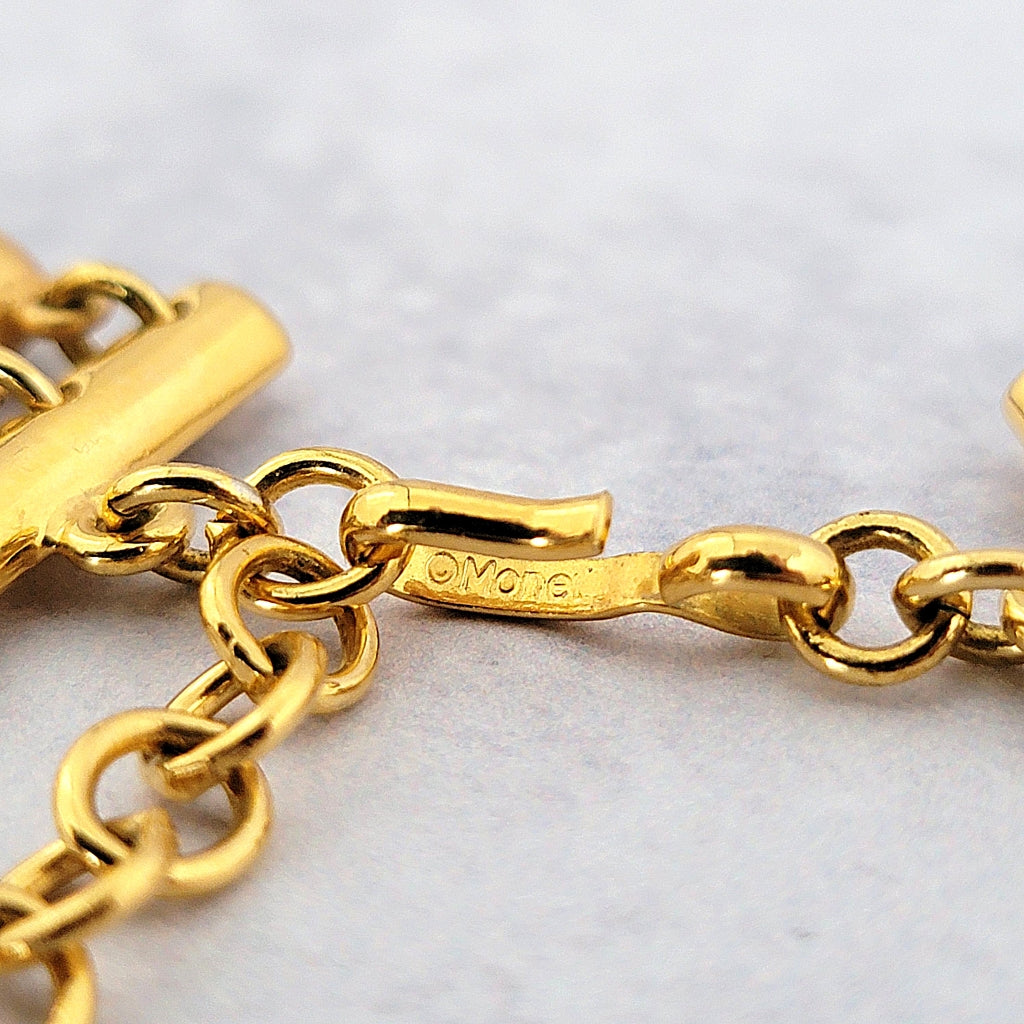 Monet signature mark inside a hook style necklace clasp.