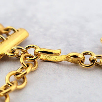 Monet signature mark inside a hook style necklace clasp.