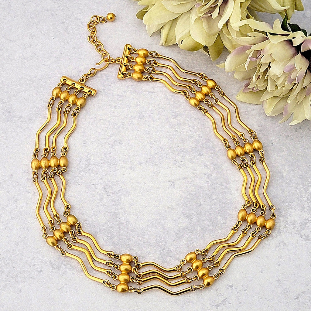 Vintage Monet gold tone midcentury style choker necklace.