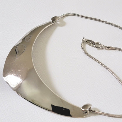 Close-up of Napier silver tone choker.