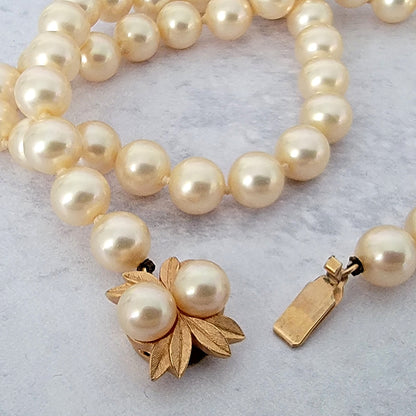 Vintage box clasp on a faux pearl choker.