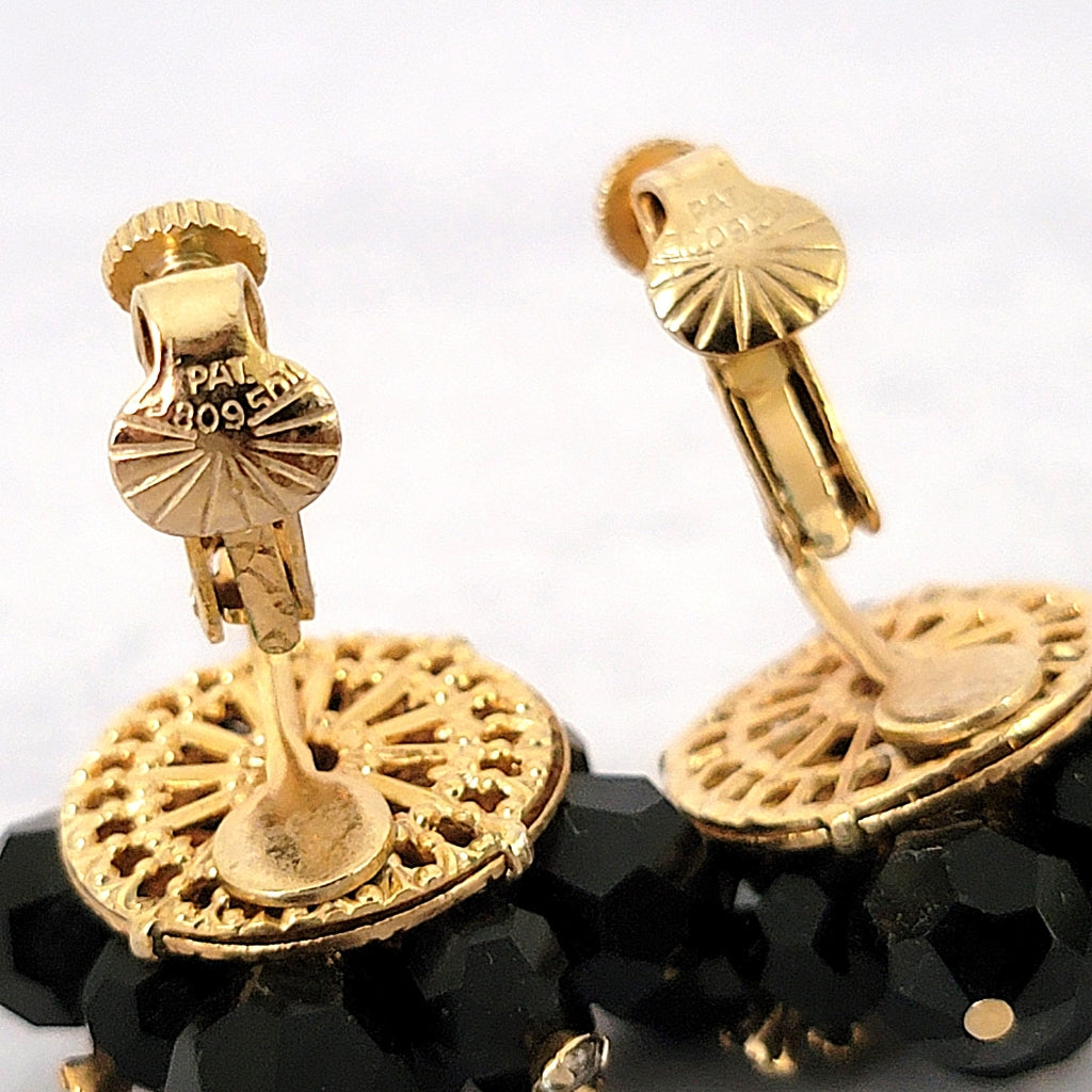 Patent number stamp inside earring clips.