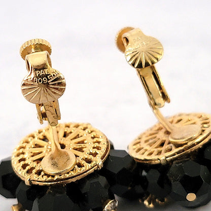 Patent number stamp inside earring clips.
