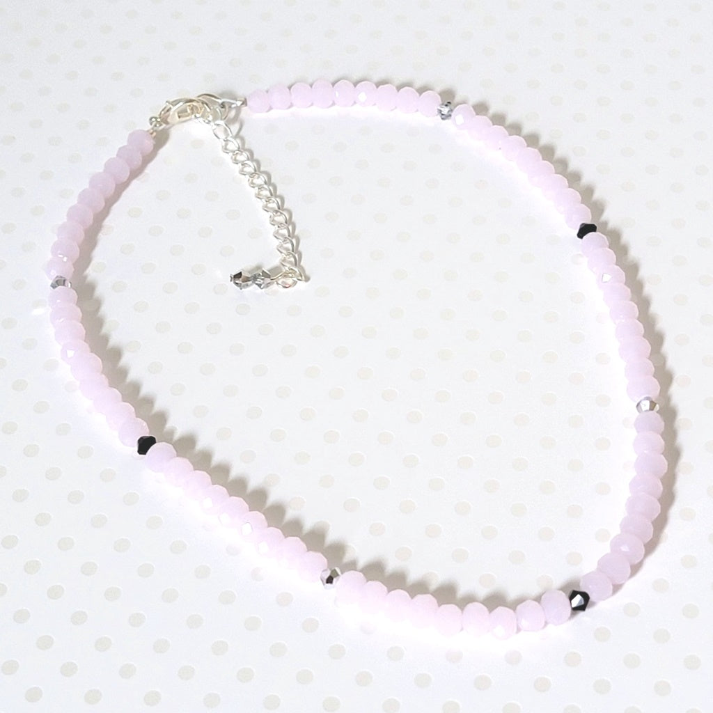 Skinny pastel pink faceted glass beaded choker, with crystal accents.