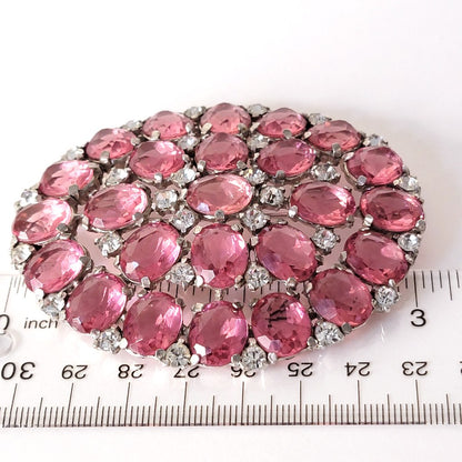 Pink lucite pin with ruler.