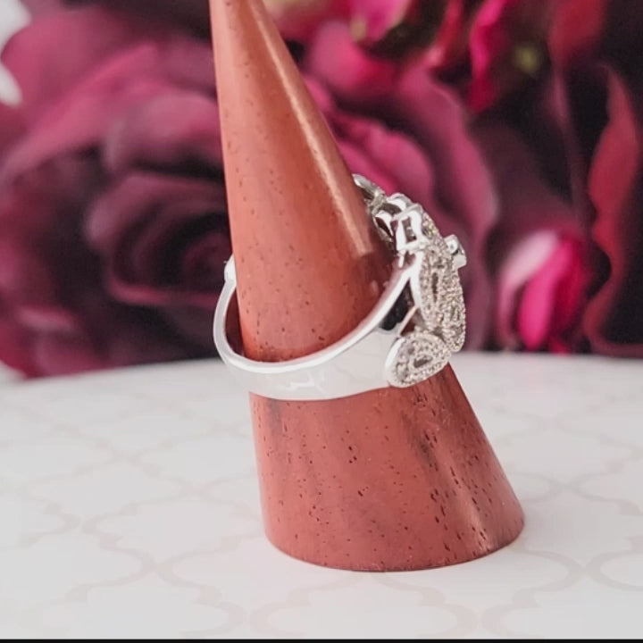 Lia Sophia silver tone flower crystal rhinestone ring.