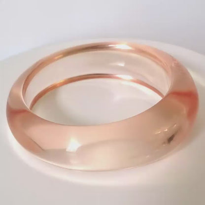Video of a clear plastic bracelet.