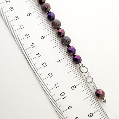 Beaded bracelet with ruler.